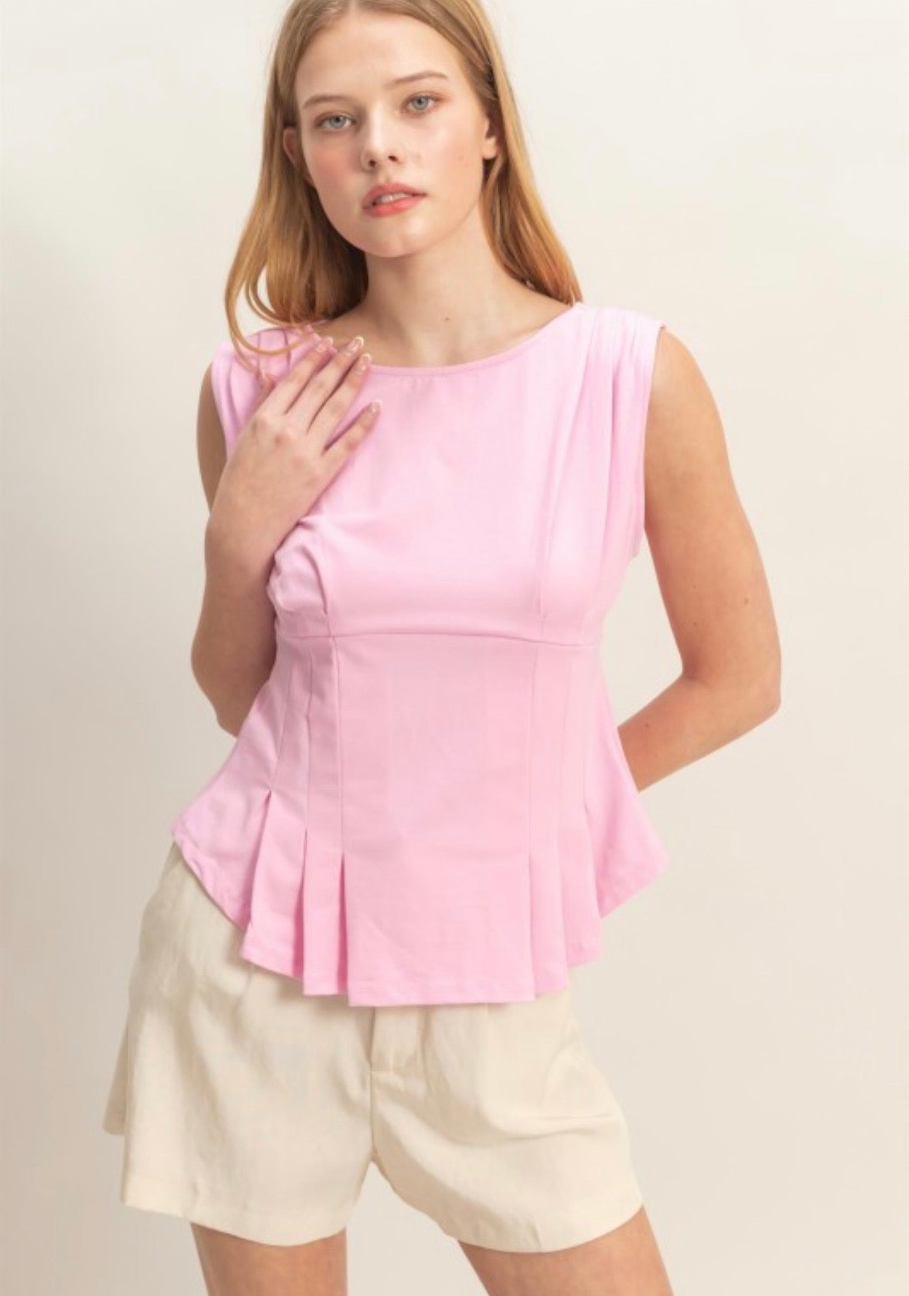 Pink peplum top