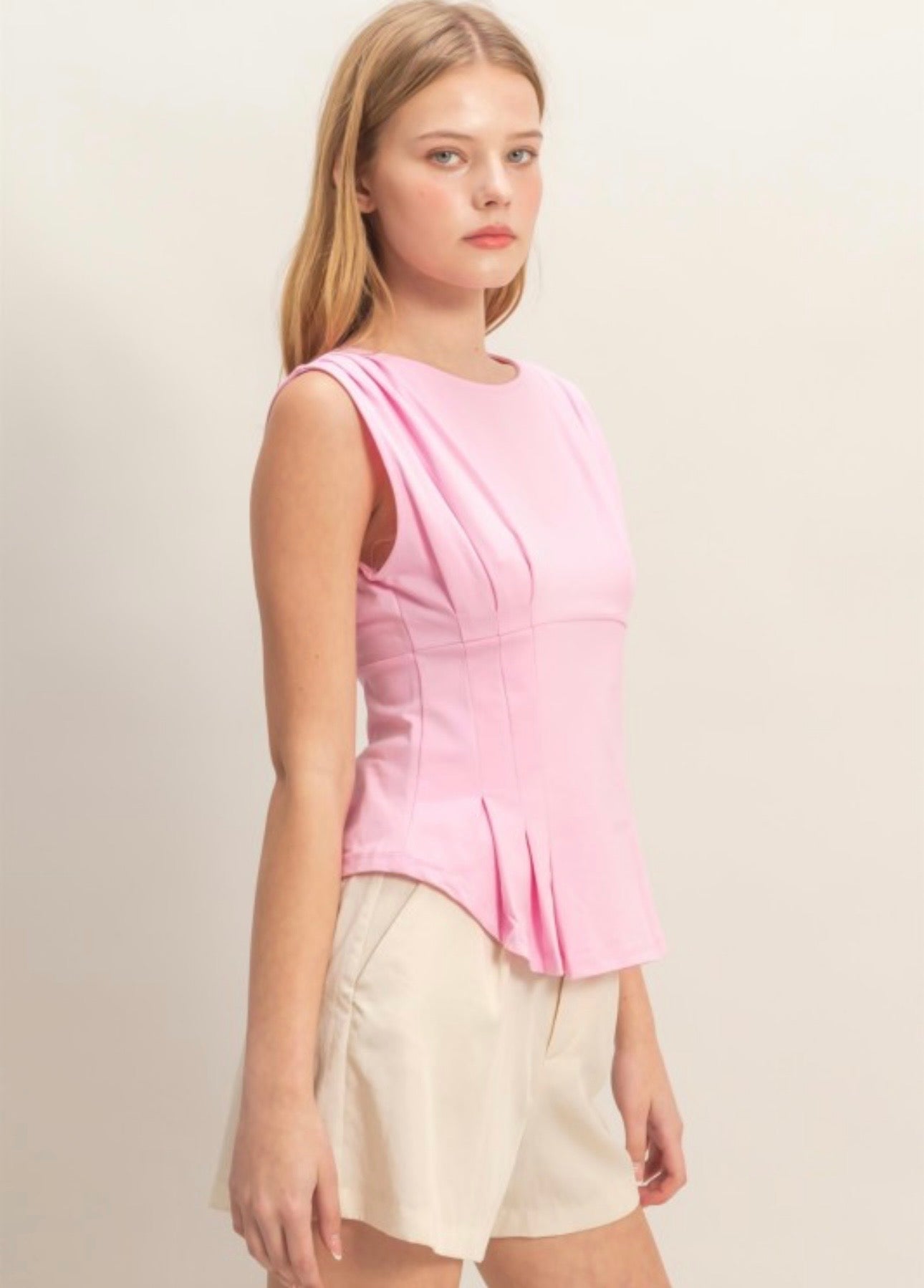 Pink peplum top